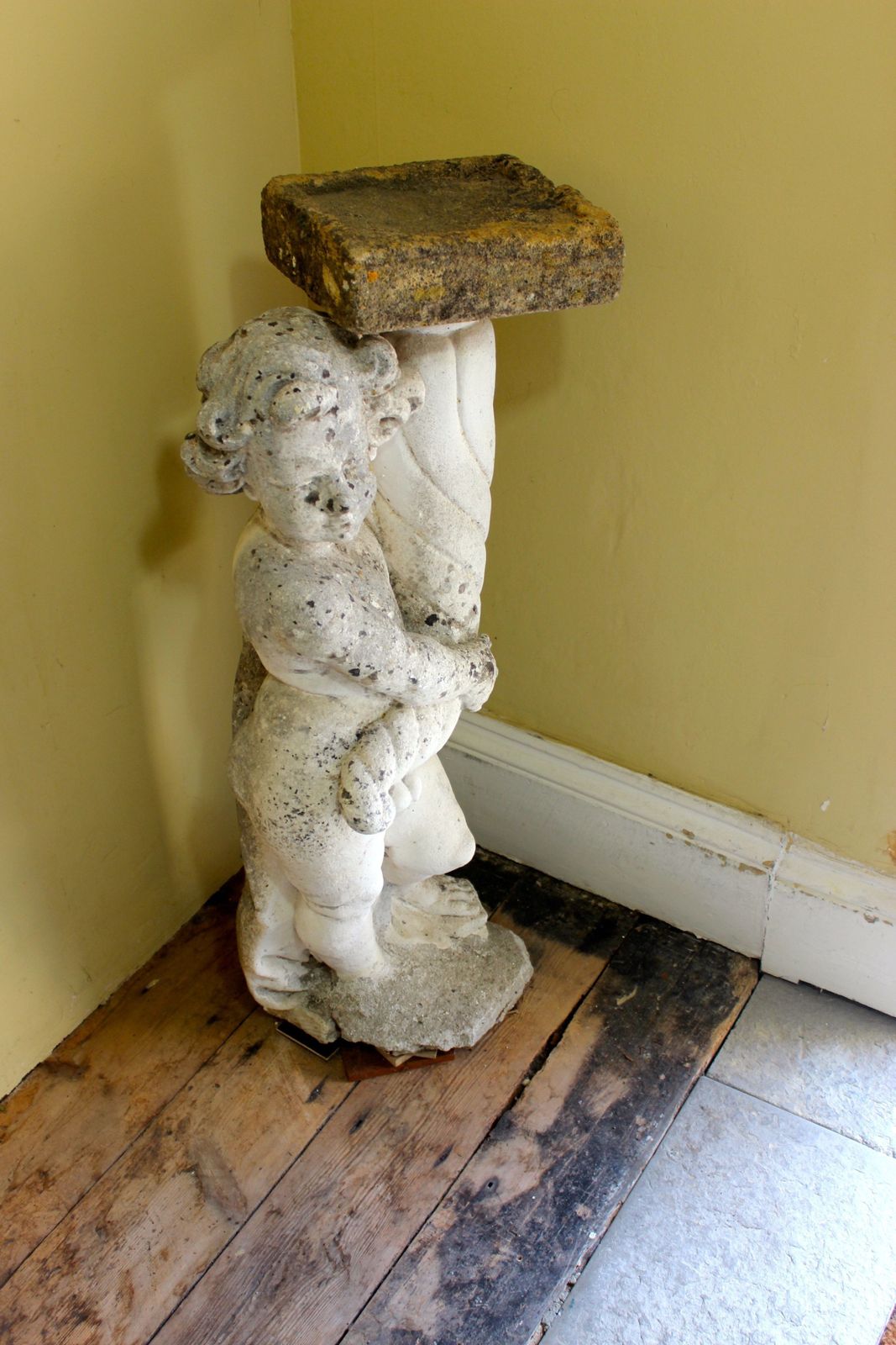 Statue Of A Boy Holding A Bird Bath photo furniture