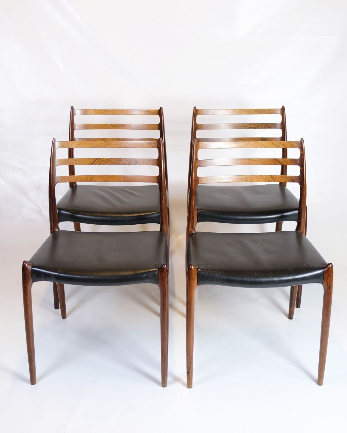 Set Of Four Dining Chairs Model 78 In Rosewood & Black Leather  By Niels Otto Møller For Jl Møllers Furniture Factory From 1950s