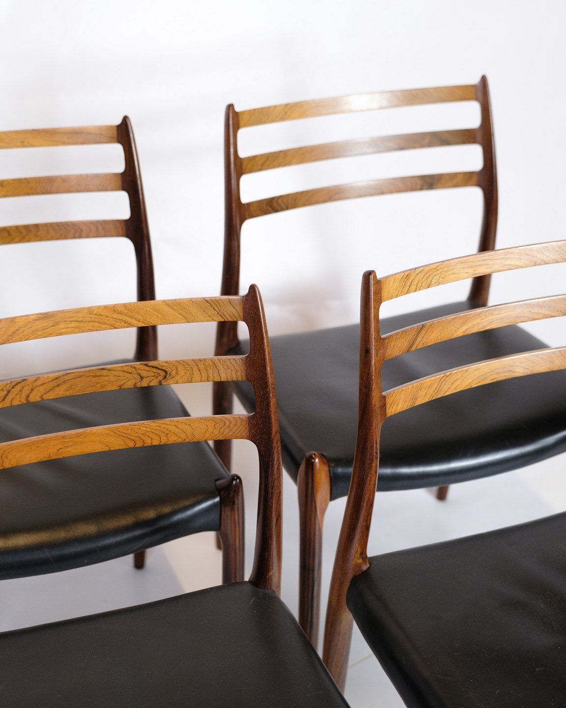 Set Of Four Dining Chairs Model 78 In Rosewood & Black Leather  By Niels Otto Møller For Jl Møllers Furniture Factory From 1950s photo furniture