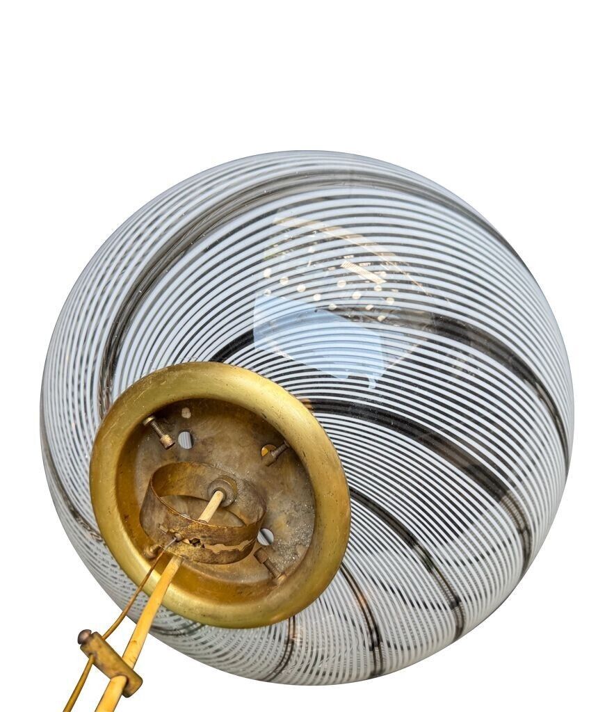 An Italian 1970s Large Murano Swirl Glass Pendant Light By Venini With Brass Top And Ceiling Rose. photo vinterior