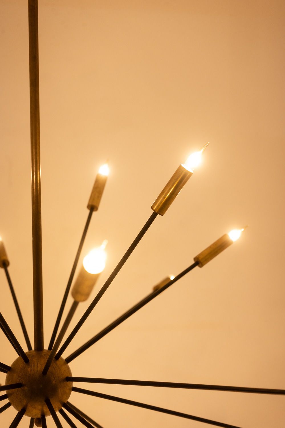 photo furniture Sputnik Shaped Chandelier In Patinated Gold Plated Brass And Black Lacquer. Contemporary.