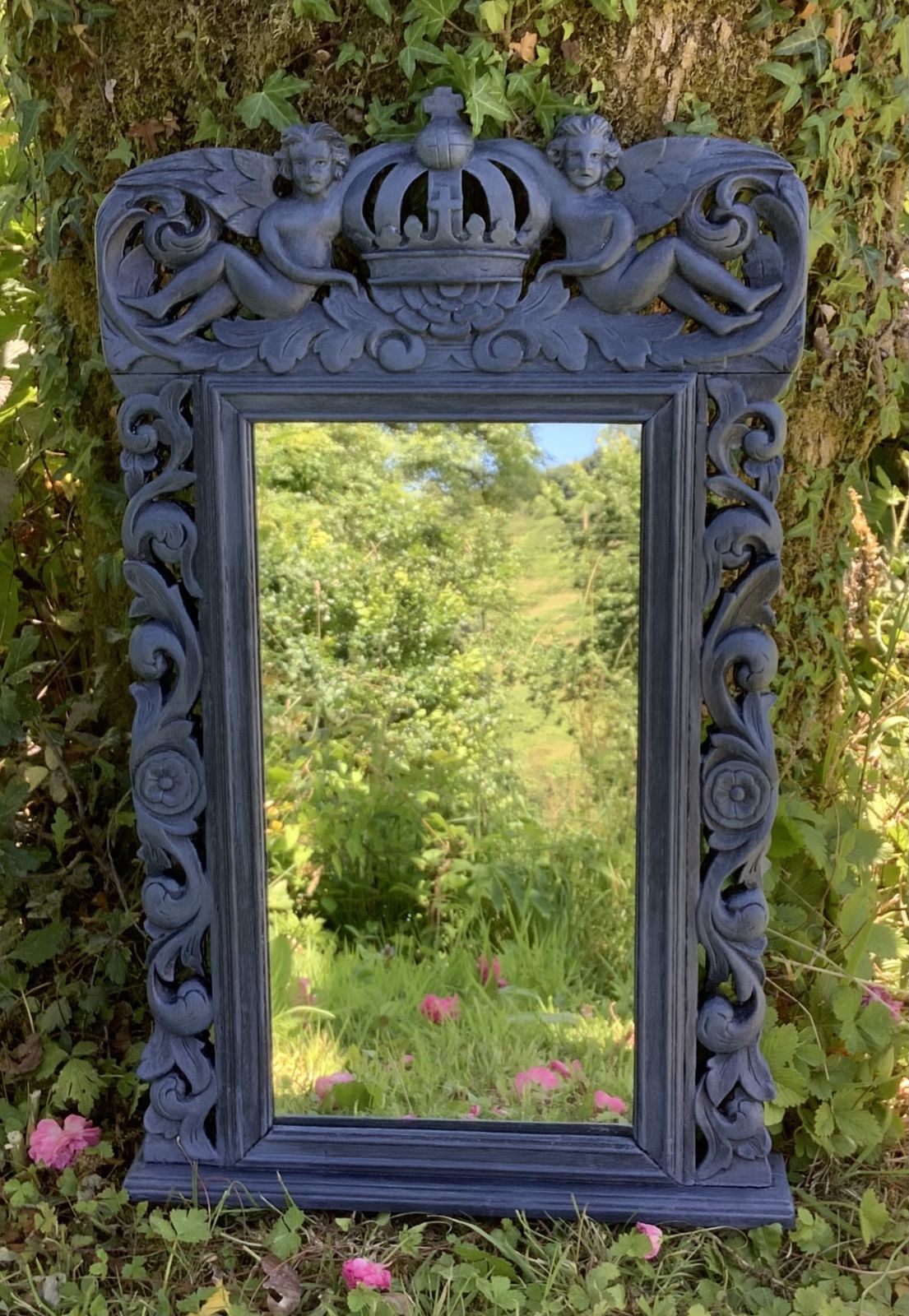 A Beautiful, Blue Carved Mirror With Angels ,Crown And Floral Design.