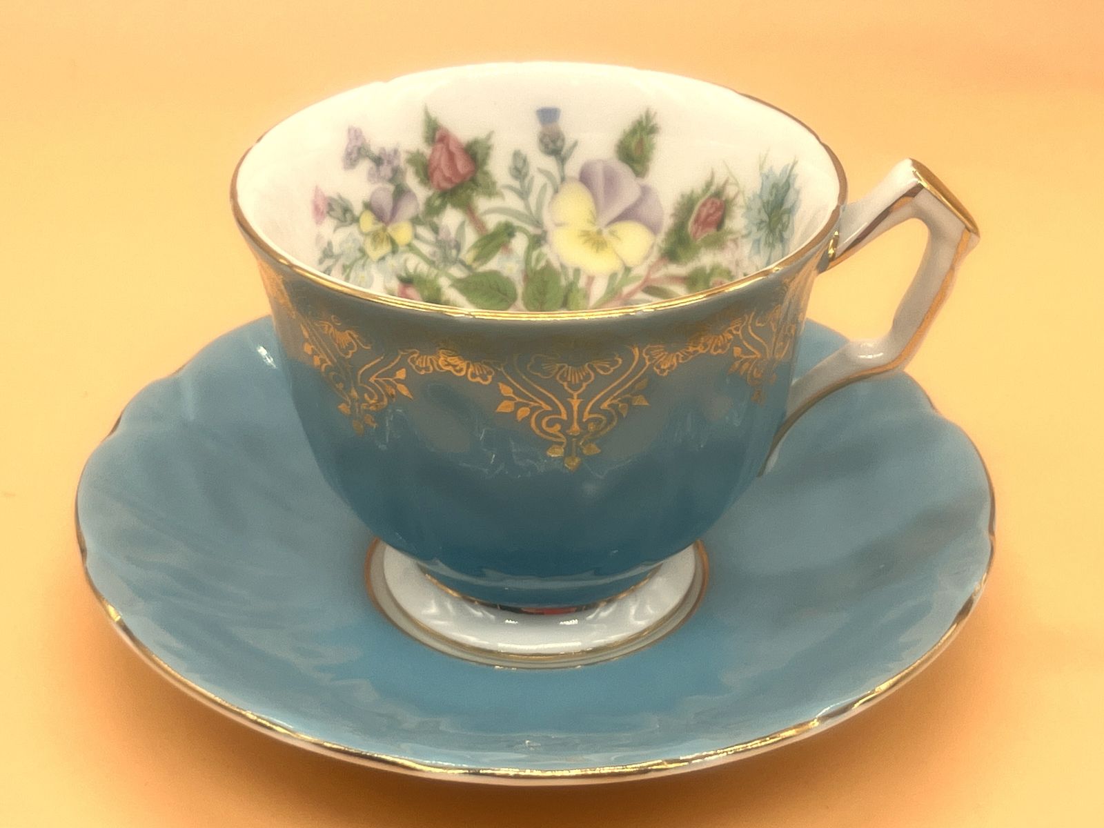 Aynsley China Crocus Shape Wild Tudor Turquoise Cabinet Tea Cup & Saucer Duo.