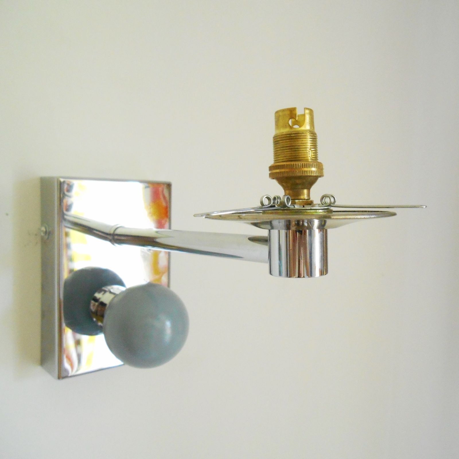 275.0 A Pair Of Unique Silver Chrome Wall Lamps With White Glass Globe Shades photo