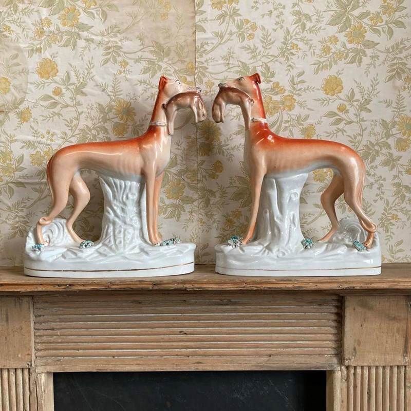 Pair Of Staffordshire Pottery Greyhounds