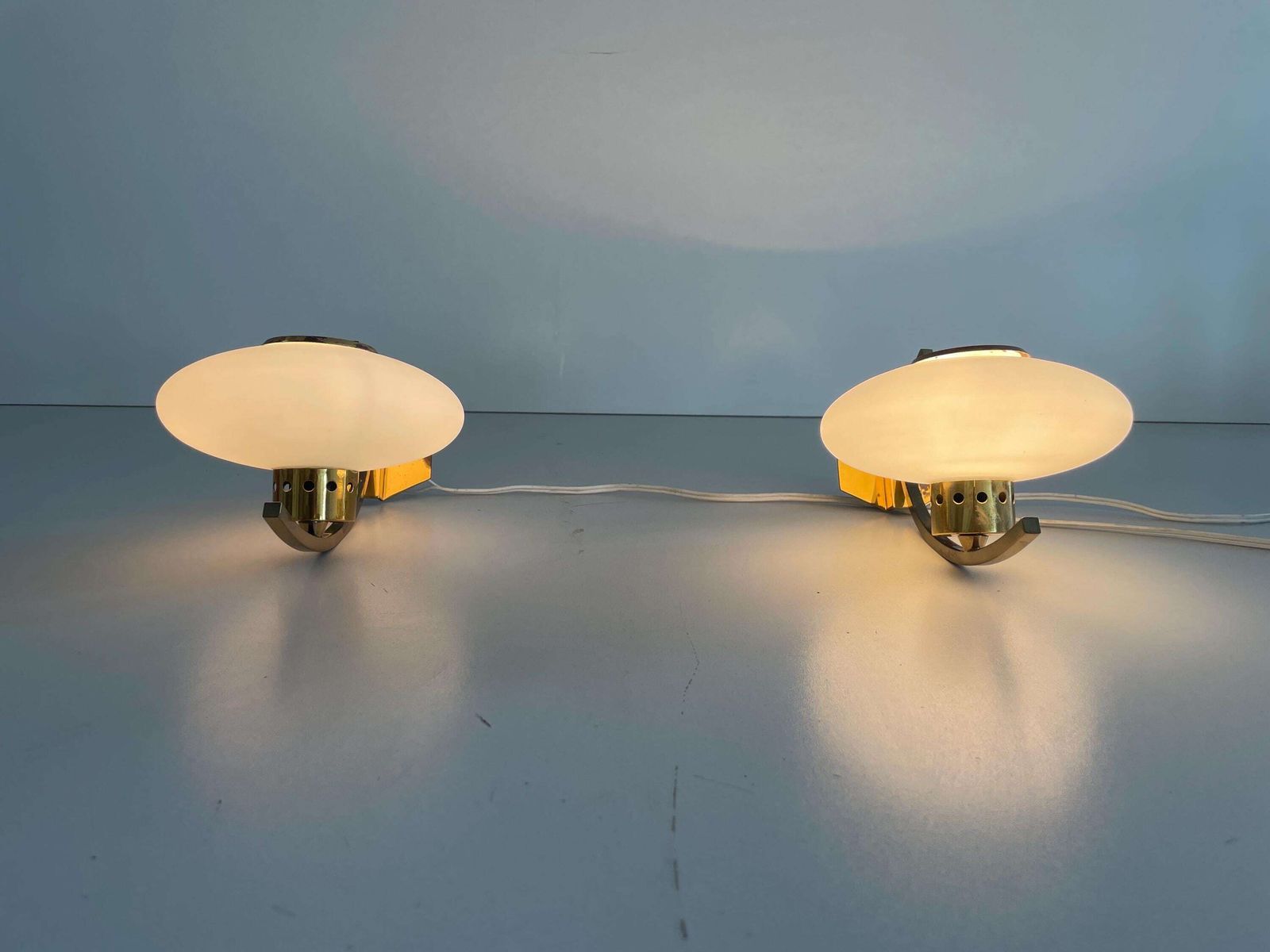 Mid Century Modern Brass And Glass Pair Of Sconces In The Style Of Stilnovo, 1960s, Italy photo furniture