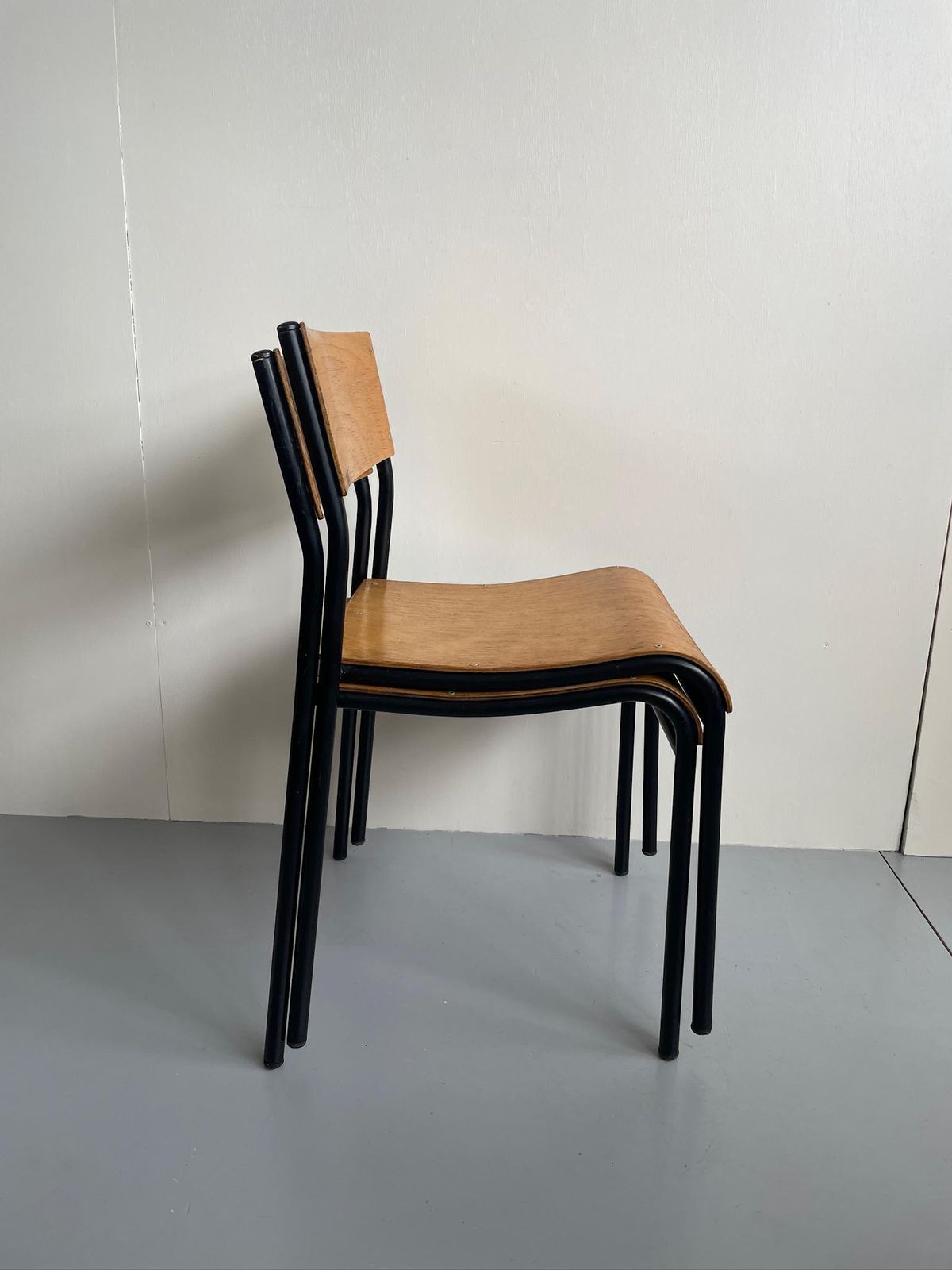 Pair Of Vintage Industrial Metal Stacking Dining Chairs With Bent Plywood Seats By Shepherd photo for sale