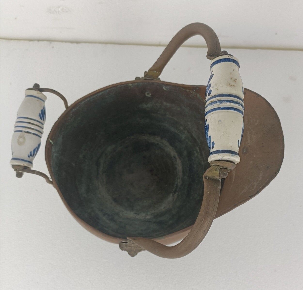 Antique Hammered Brass Kettle Bowl With Delft Blue White Porcelain Handles Plant photo for sale