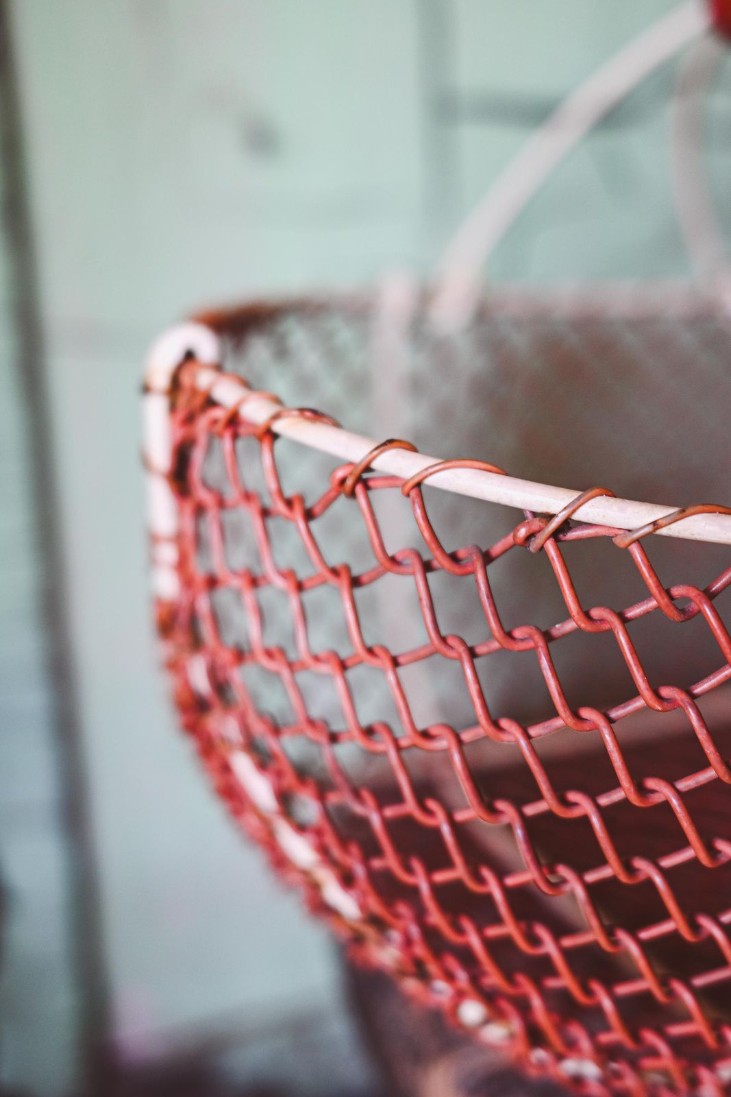 Rustic Red Wire Basket With Wooden Handle   Versatile Storage Solution For Home And Garden photo for sale