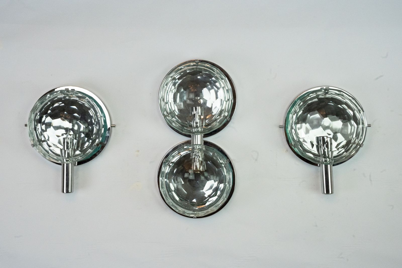 Set Of Three Cristal Art Sconces In Chrome And Cut Glass. Italy 1970s