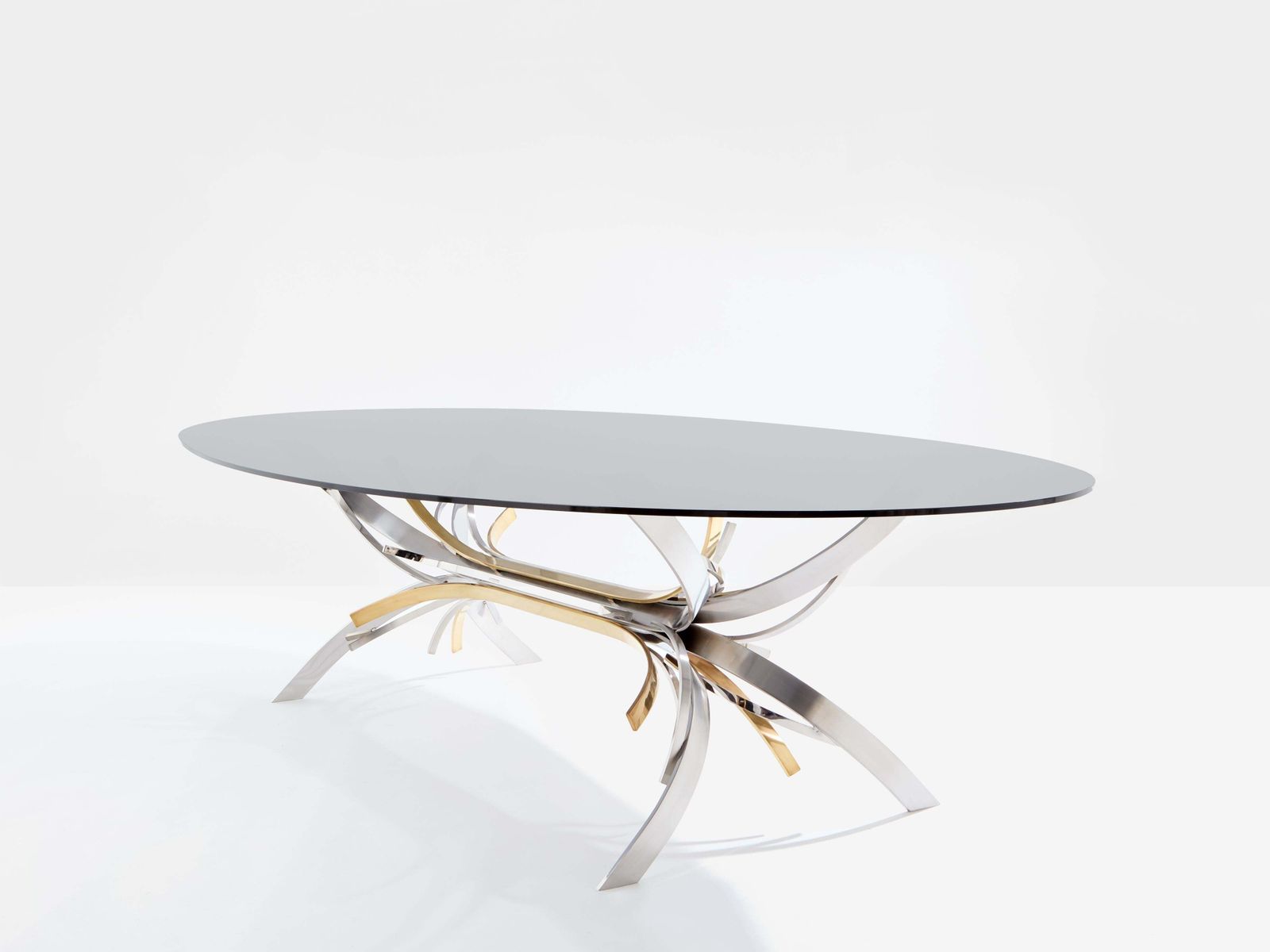 photo vinterior Table à manger Maria Pergay en acier poli et laiton, modèle Gerbe, 1970