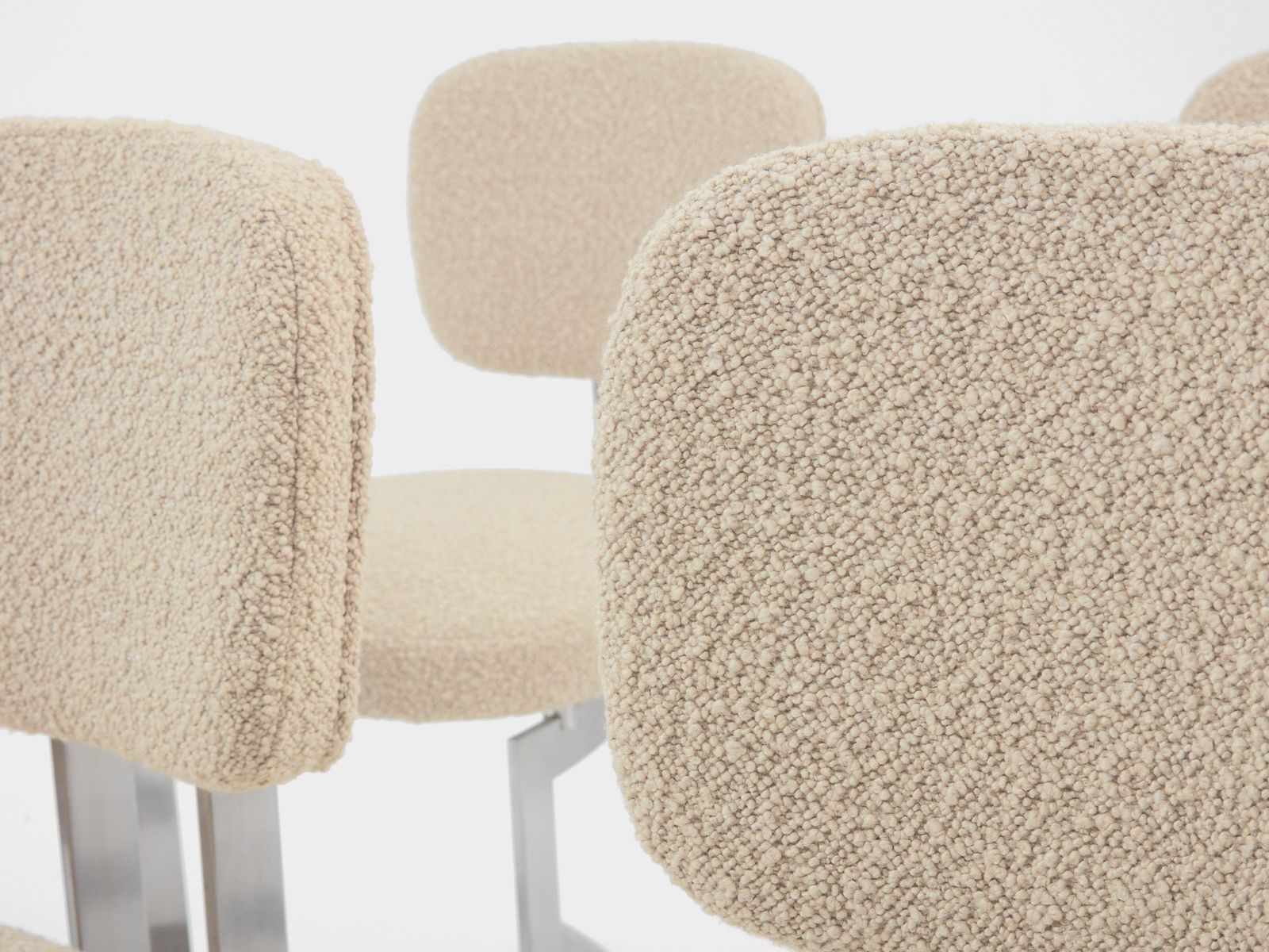photo for sale Ensemble de douze chaises Paul Legeard en acier inoxydable et laine bouclé, 1970