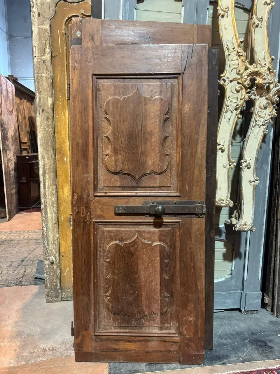 Interior Door In Walnut Wood, One Leaf With Carved Wavy Panels, Italy photo furniture