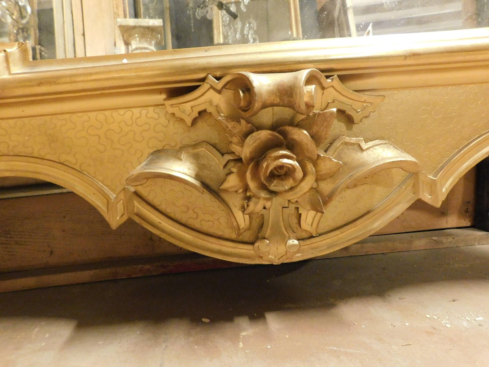 photo for sale Important And Big Richly Carved And Gilded Mirror With Sculpture, Italy