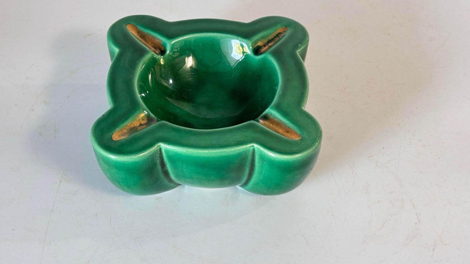 photo furniture 1940s French Art Deco Green Ceramic Ashtray With Gilded Details, Four Cigarette