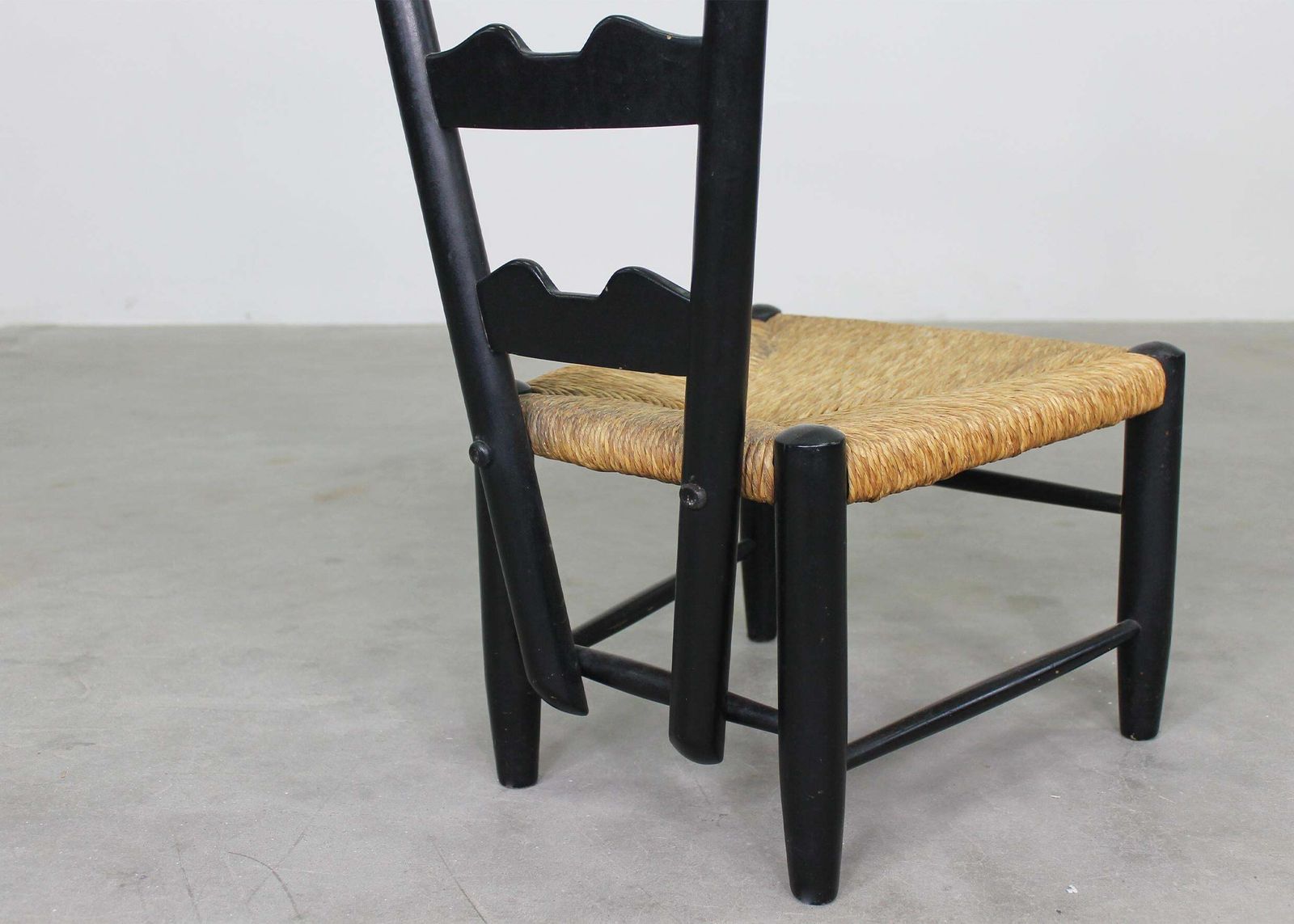 photo furniture Gio Ponti Set Of Two Fireside Chairs In Black Lacquered Wood And Rush 1950s