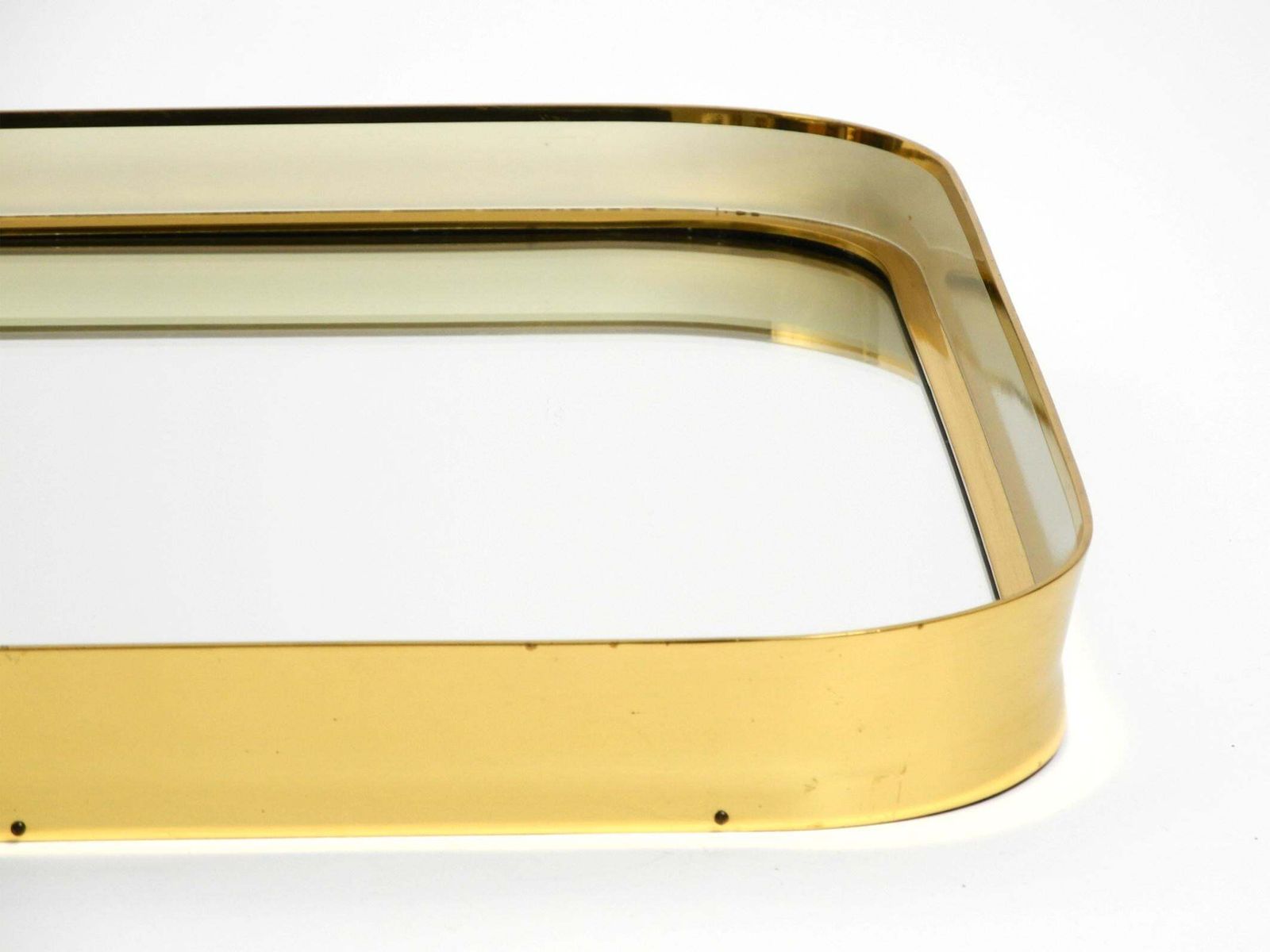photo for sale Mid Century Modern Wall Mirror With Heavy Brass Frame By Münchener Zierspiegel