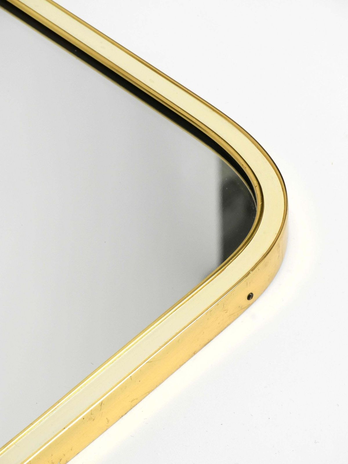 photo buy Large Heavy Long Mid Century Brass Wall Mirror By Münchner Zierspiegel