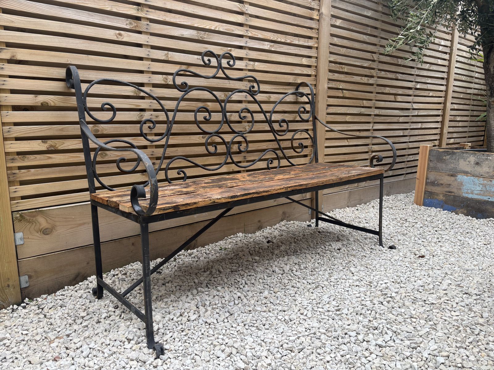French Wrought Iron Garden Bench With Weathered Wooden Seat