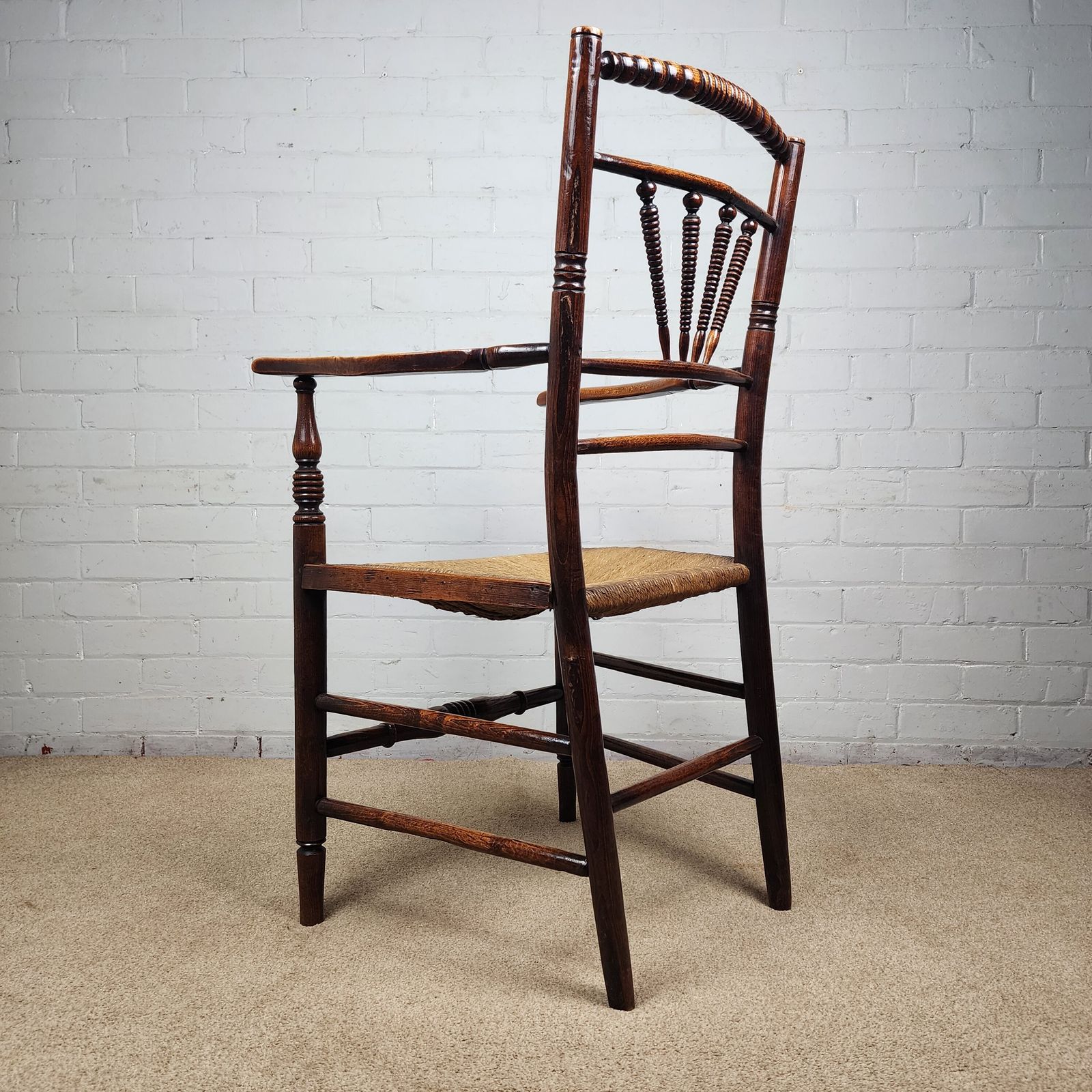 A George III Elm And Fruitwood Spindle Back Carver Chair photo buy