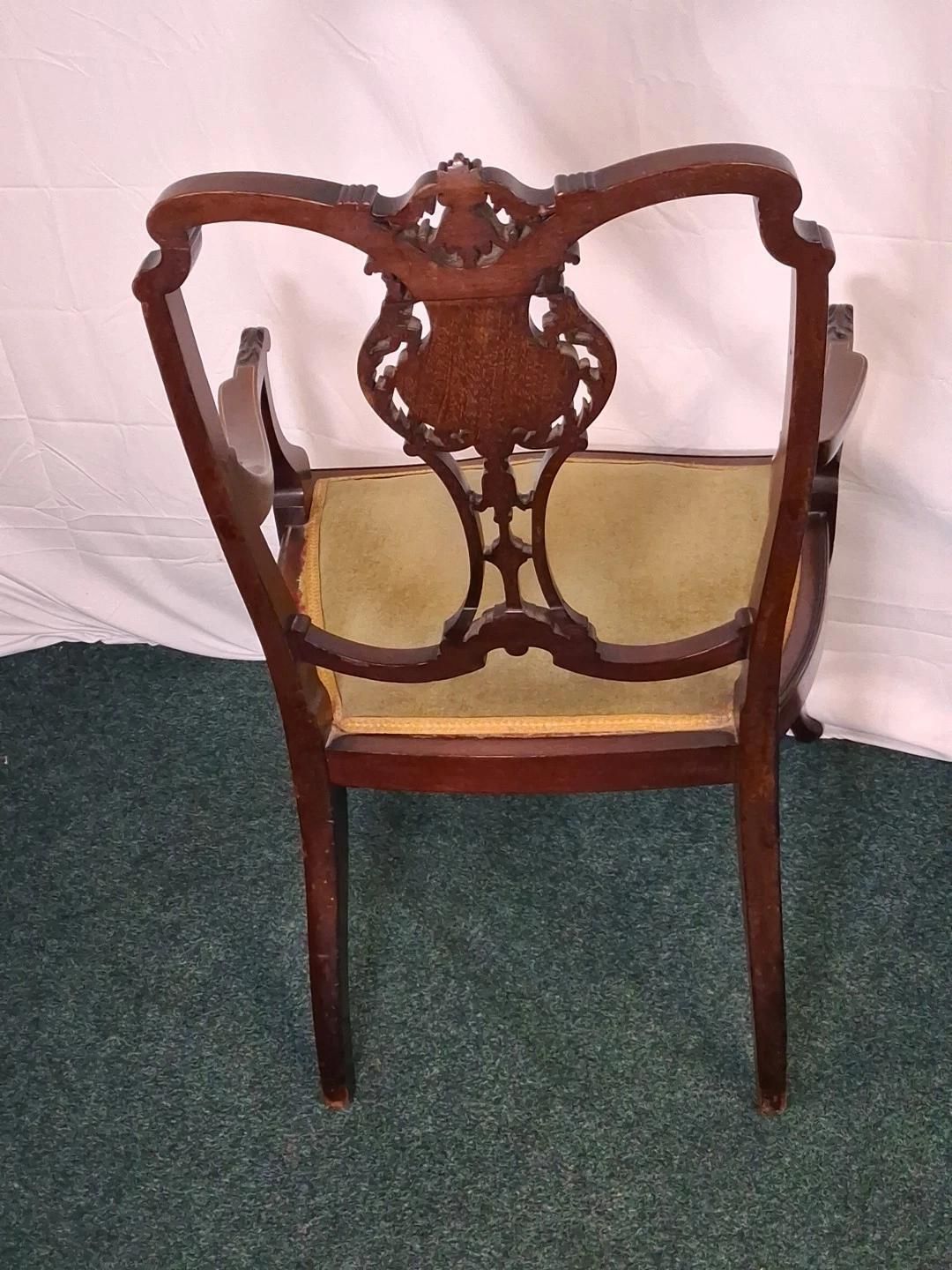 Victorian Elegant Chair With Intricate Carving photo vintage