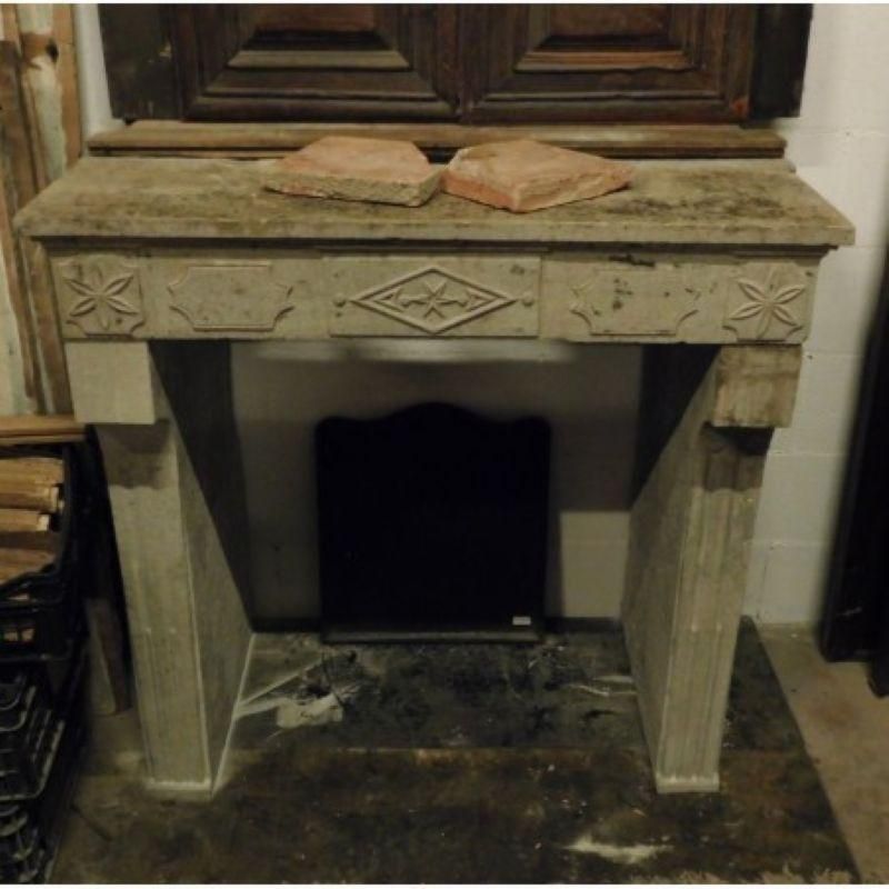 Fireplace Mantel Carved In Grey Stone With Decorations, France photo for sale