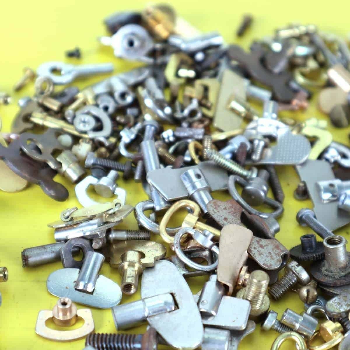 Lot Of Spare Parts For Alarm Clocks, Keys, Screws And More photo for sale