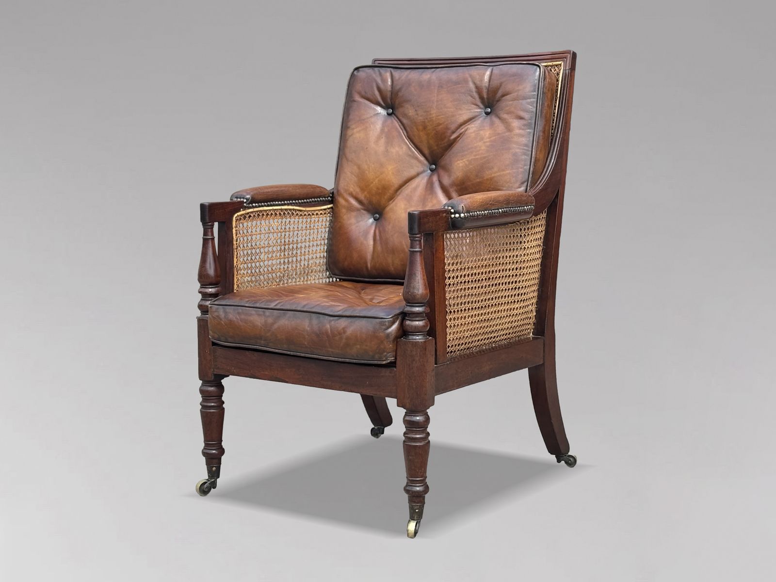 Early 19th Century George IV Period Mahogany Caned Library Bergère
