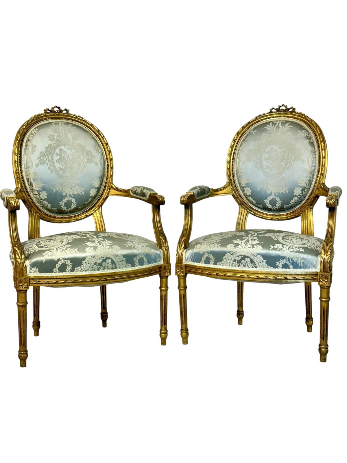 photo buy Pair Of Louis XVI Medallion Carved And Gilded Wood Armchairs