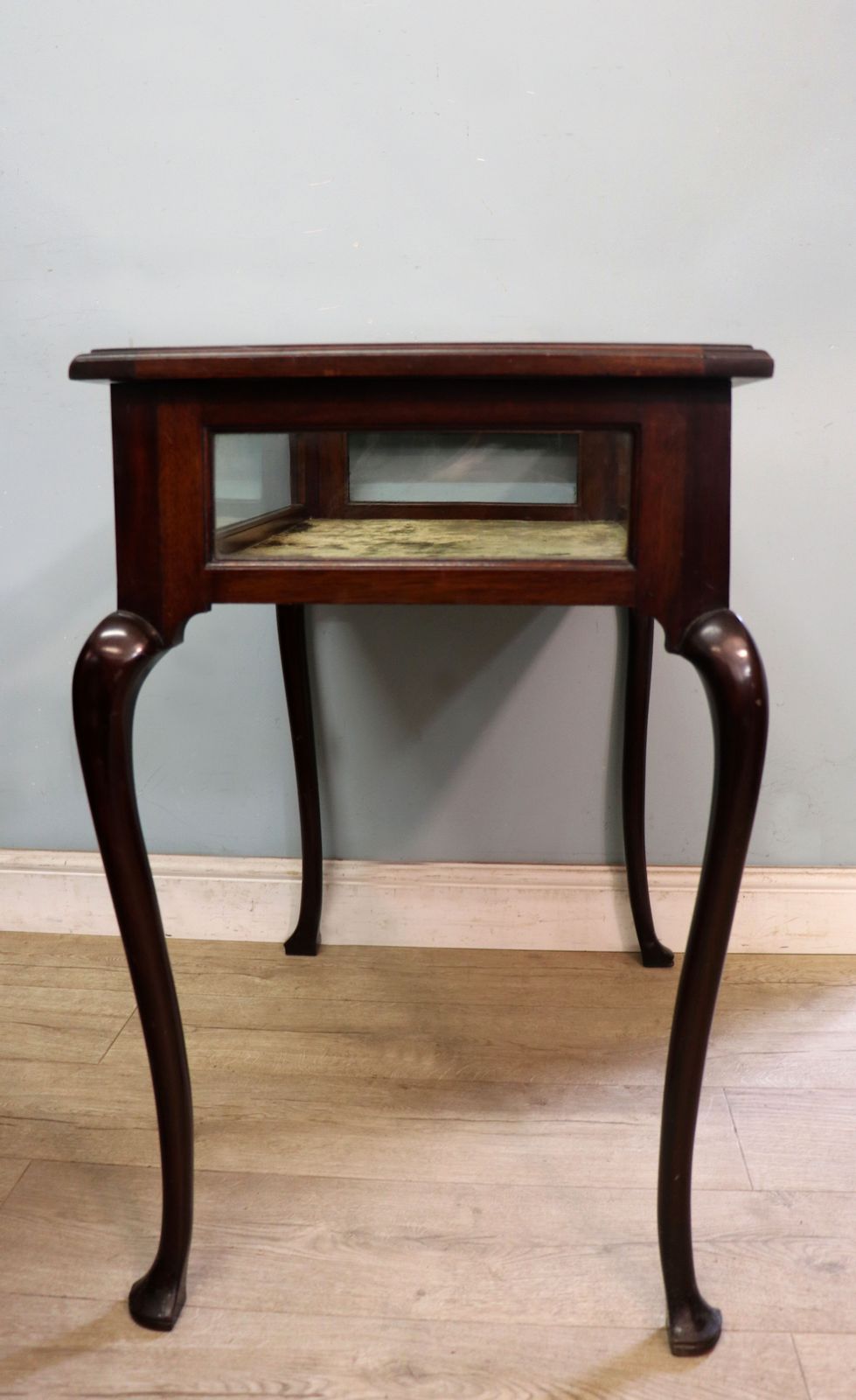 A Wonderful Vintage Bijouterie Display Table And Sign Written Detail For Breitling Watches. photo furniture