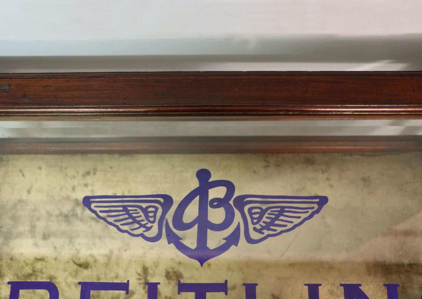 A Wonderful Vintage Bijouterie Display Table And Sign Written Detail For Breitling Watches. photo vinterior