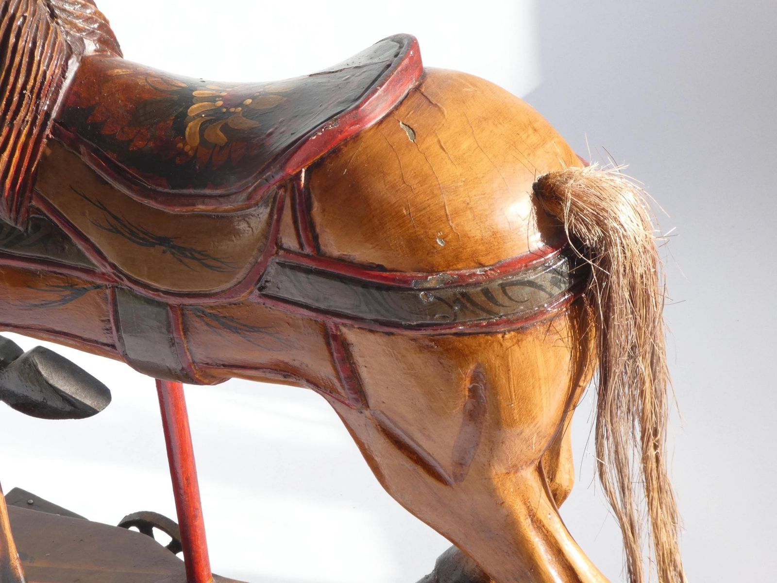 Wood Carved Rocking Horse With Glass Eyes, Carousel Horse With Floral Painted Details, Old Animal Toy On Wheels, Art Object photo vintage