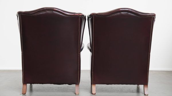 Set Of 2 Beautiful And Comfortable Burgundy Red Cowhide Wing Chairs In English Style With A Beautiful Patina photo Furniture