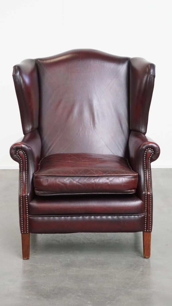 Charming And Comfortable Burgundy Red Cowhide Wing Chair In English Style With A Beautiful Patina photo furniture