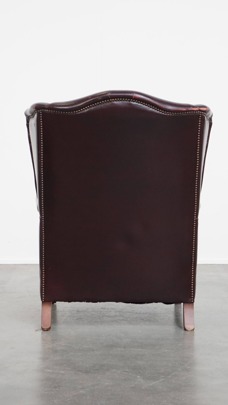 Charming And Comfortable Burgundy Red Cowhide Wing Chair In English Style With A Beautiful Patina photo Furniture