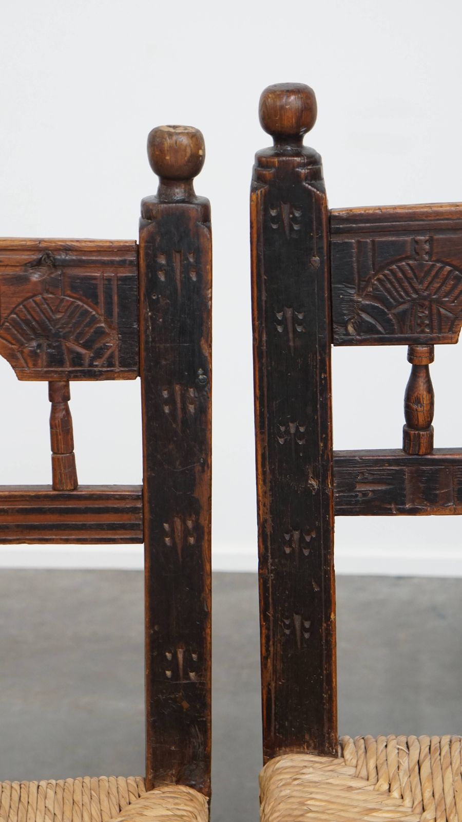 photo for sale Nice Unique Set Of 2 Antique Spanish Farm Chairs With Woven Wicker Seat And Beautiful Wood Carving