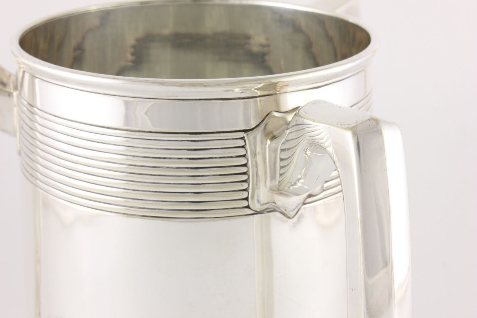 photo furniture Silver Plate Three Handled Tyg. Glass Bottom Presentation Cup Tankard.