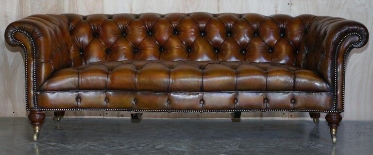 Fine Important Restored Pair Of Antique Howard & Sons Leather Chesterfield Sofas photo vinterior