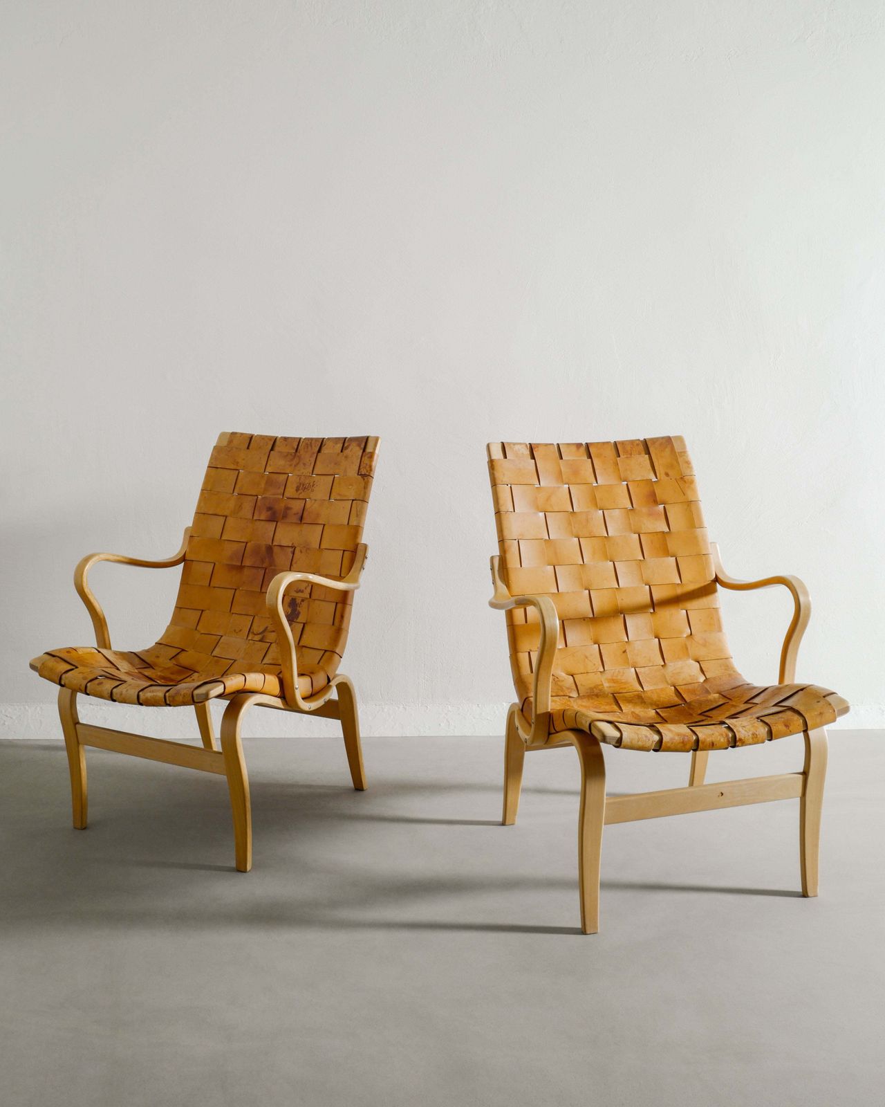 A Pair Of Swedish Mid Century Wooden "Eva" Armchairs In Birch & Patinated Leather By Bruno Mathsson, 1970s photo vinterior