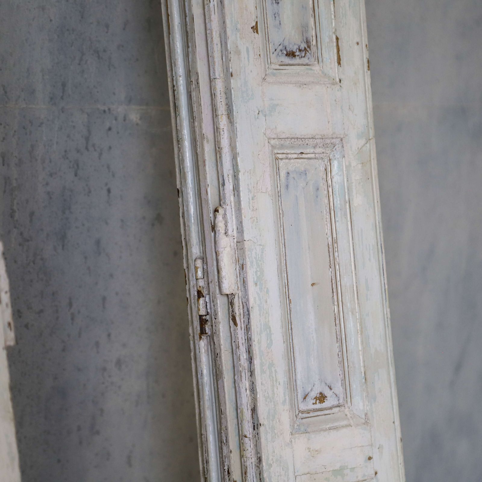 Pair Of Antique Panelled Tri Folding Shutters In Original Cream Paint photo for sale