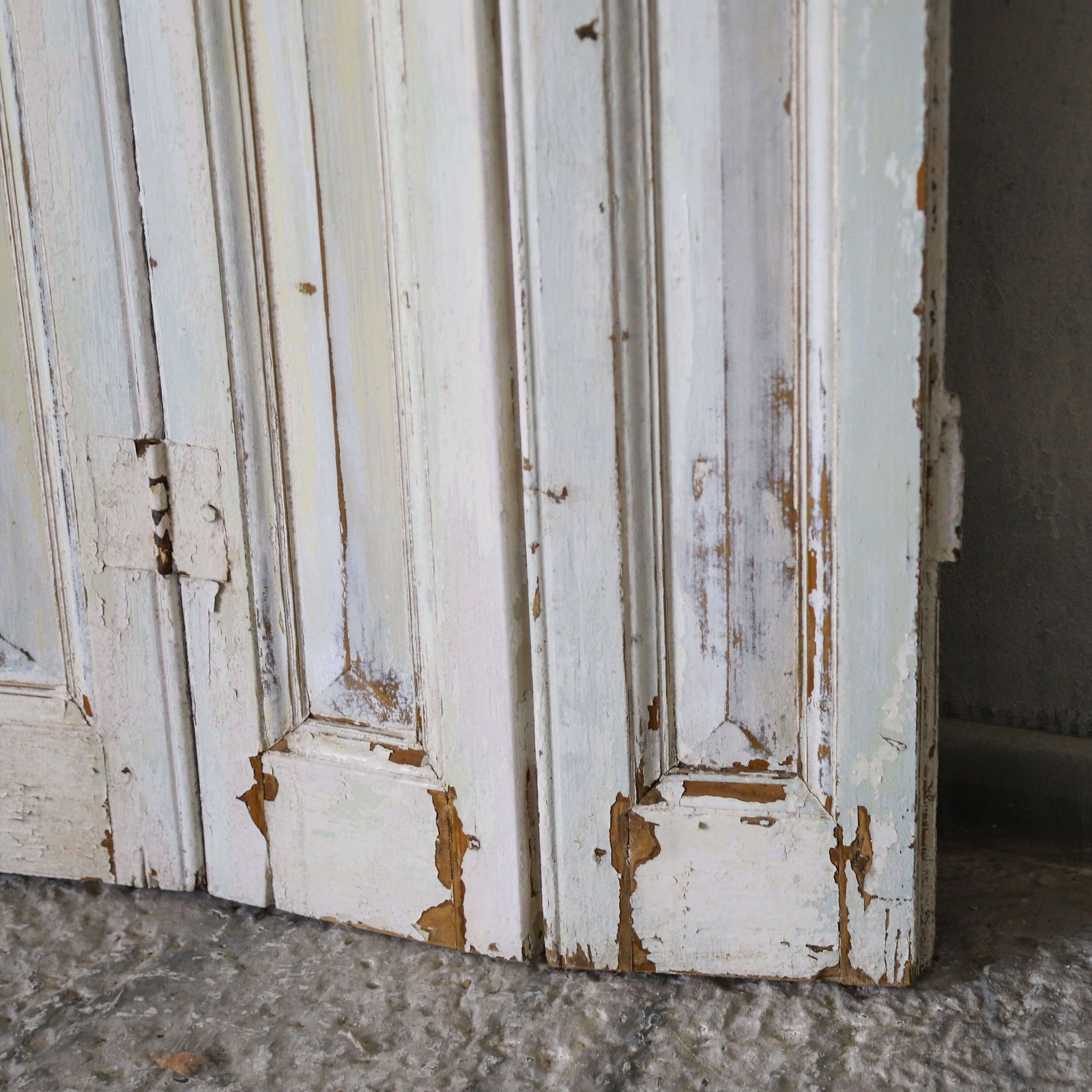 photo furniture Pair Of Antique Panelled Tri Folding Shutters In Original Cream Paint