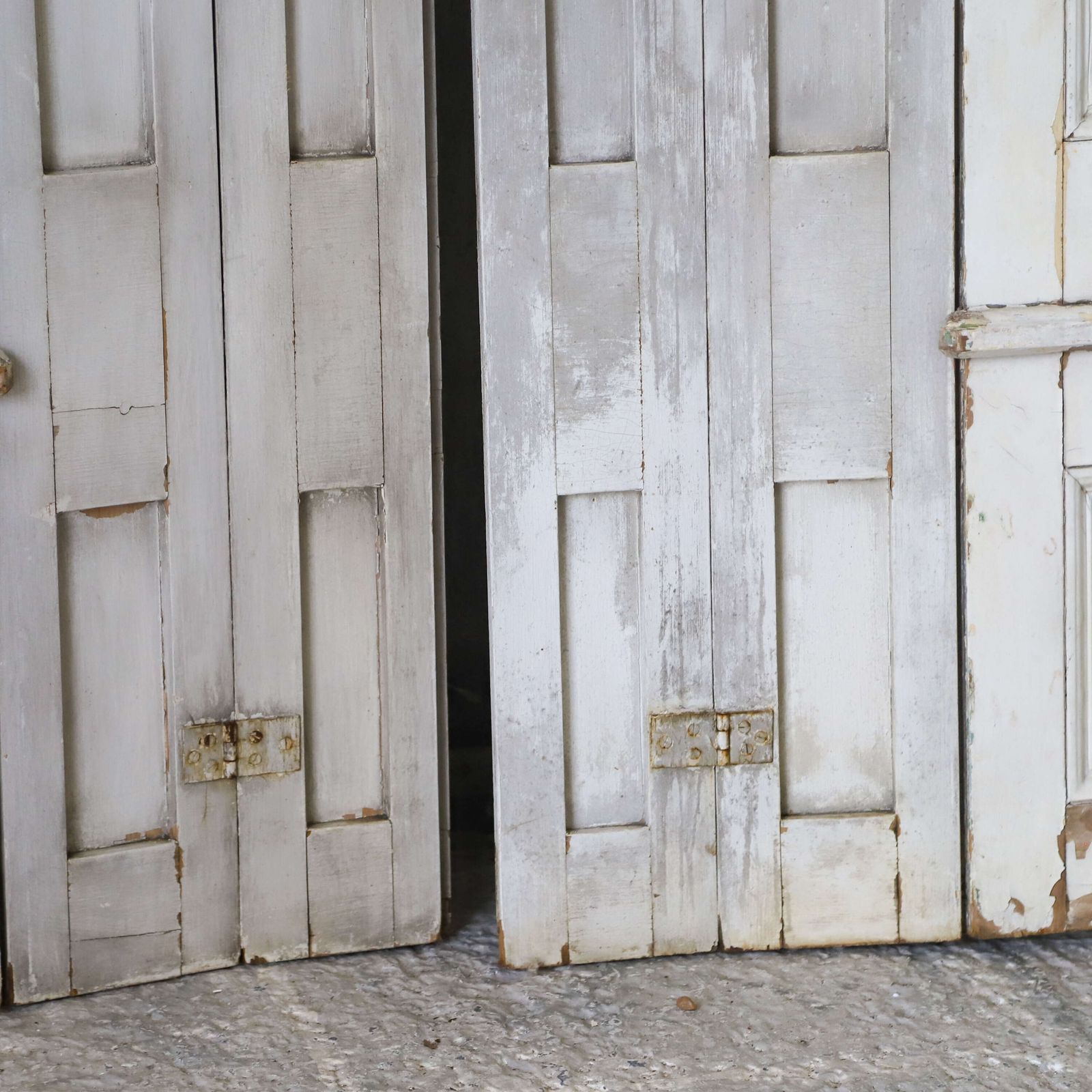 Home Fixtures Pair Of Antique Panelled Tri Folding Shutters In Original Cream Paint photo