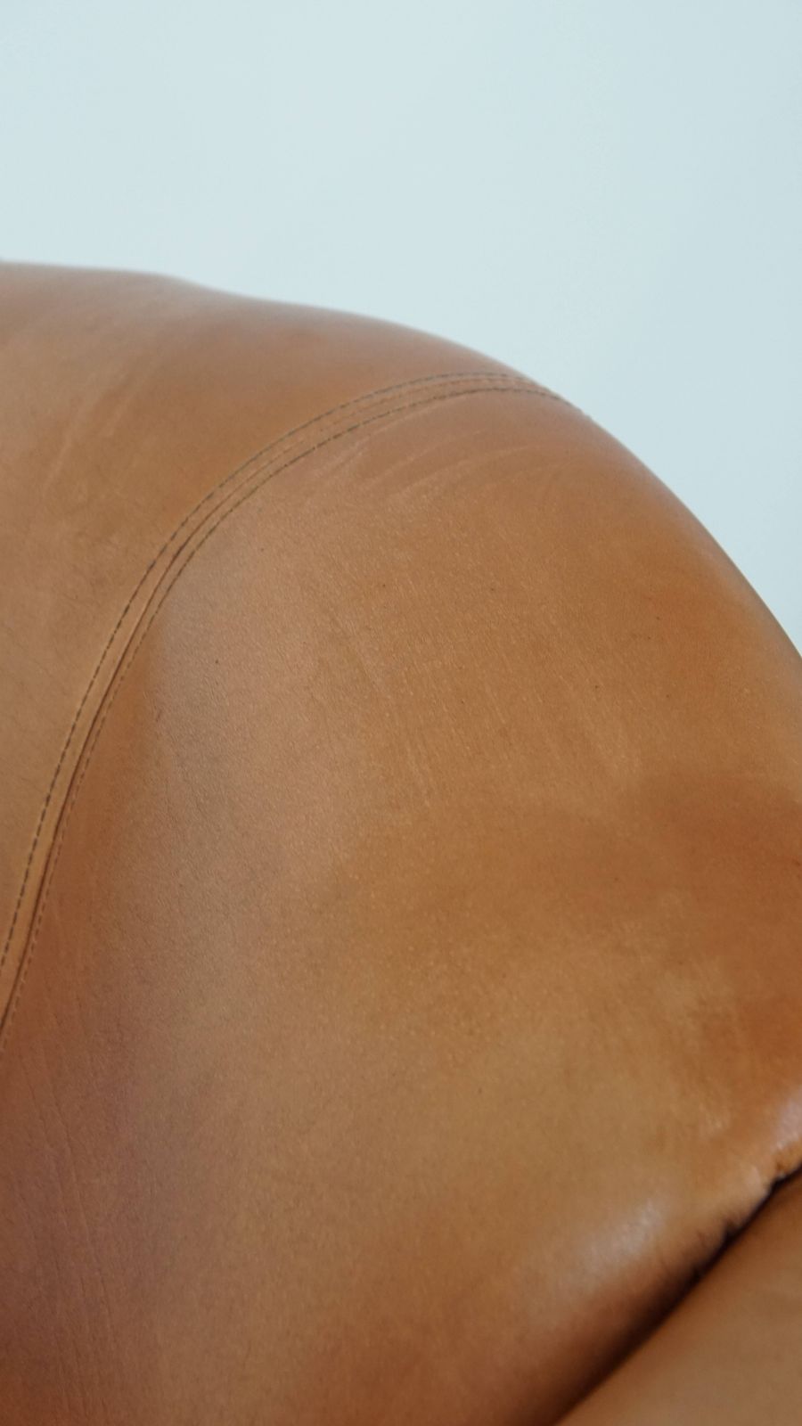 photo buy Unique And Comfortable Wing Chair Made Of Cowhide Leather Finished With Decorative Studs And Beautiful Details