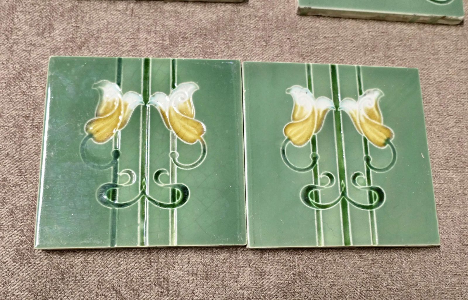 A Set Of 8 Art Nouveau Embossed Ceramic Tiles photo for sale