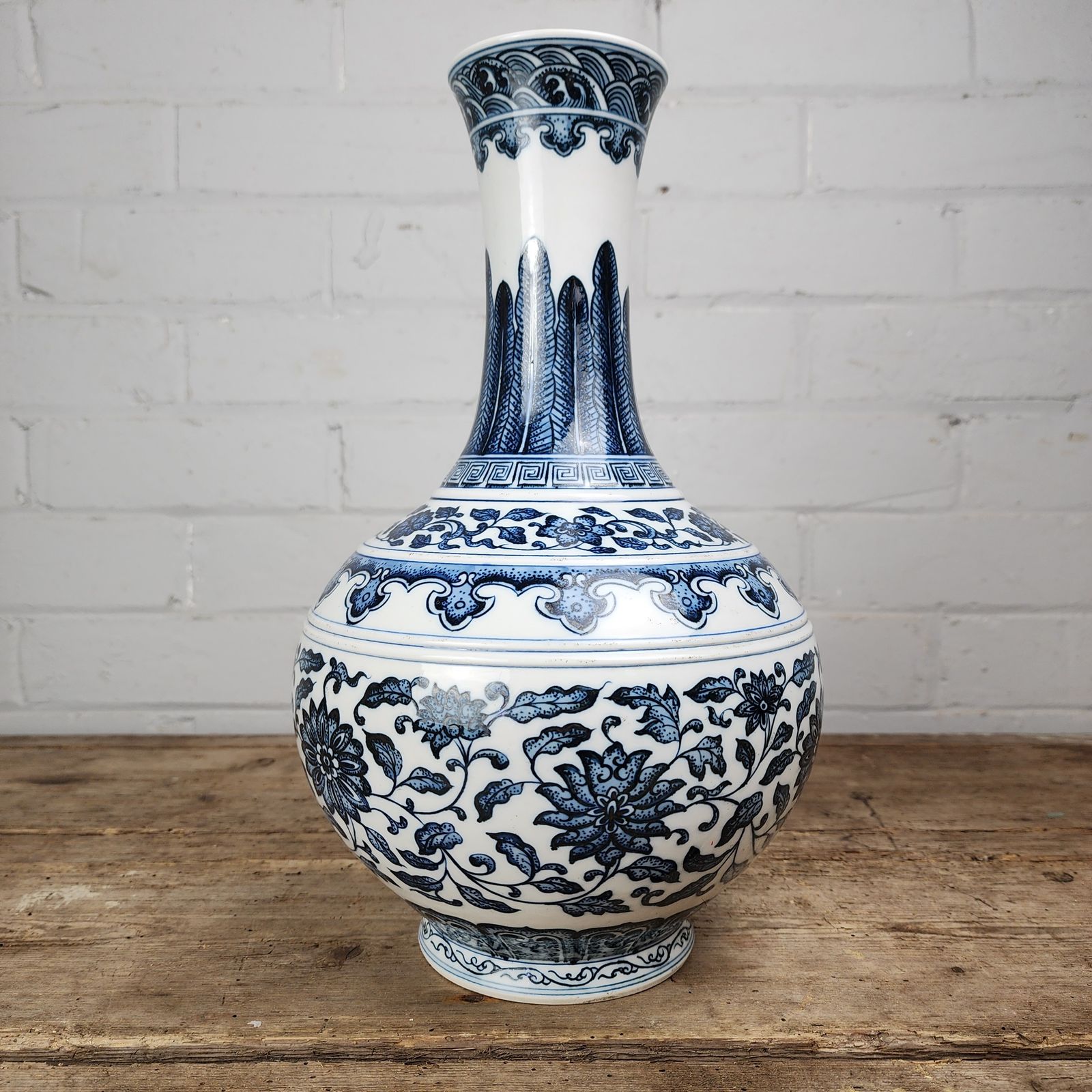 A Blue And White Bottle Vase With Quianlong Seal Mark In Underglaze Blue photo furniture