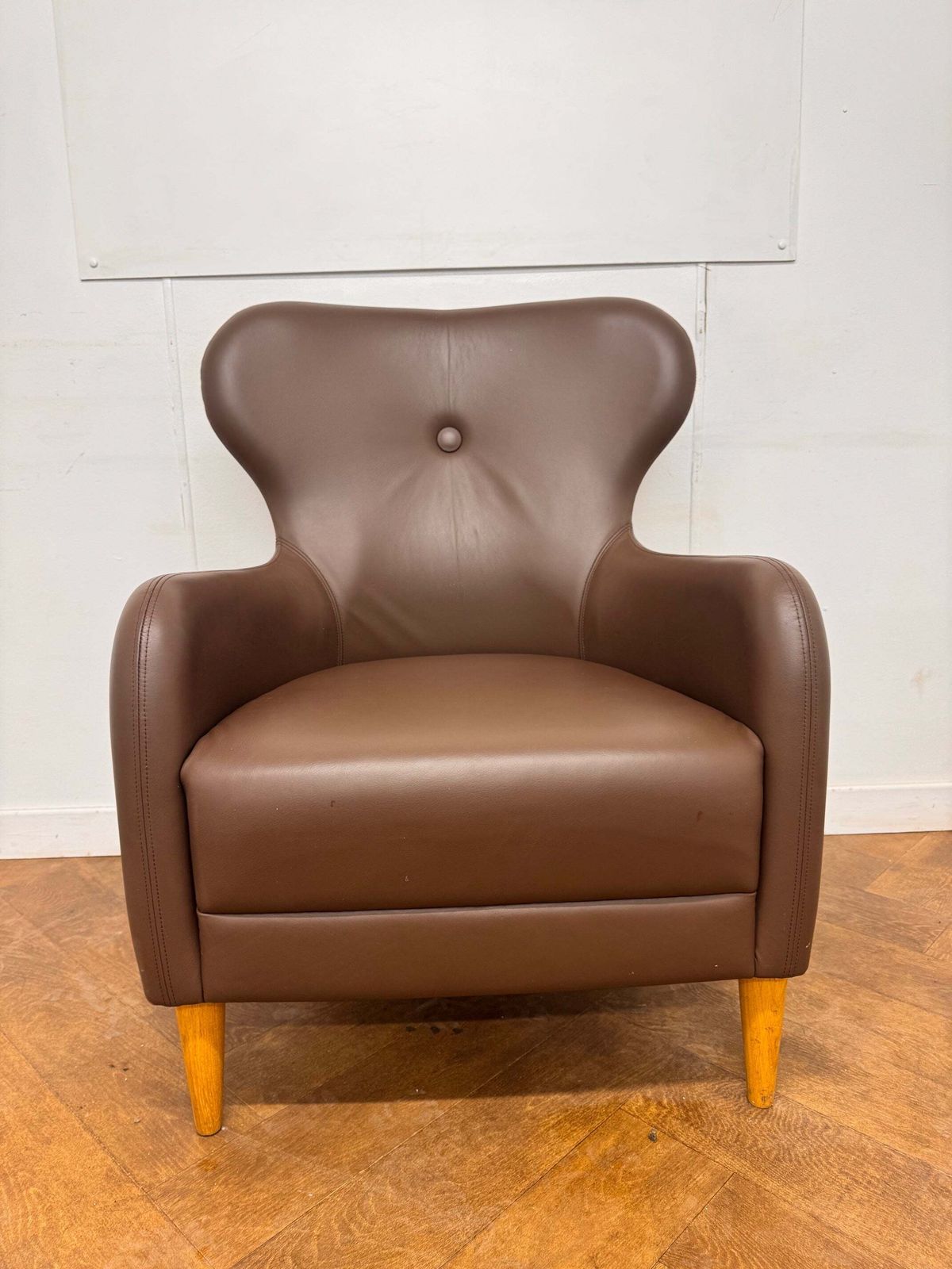 A Pair Of Boss Design "Mrs" Wing Back Button Back Brown Leather Armchair