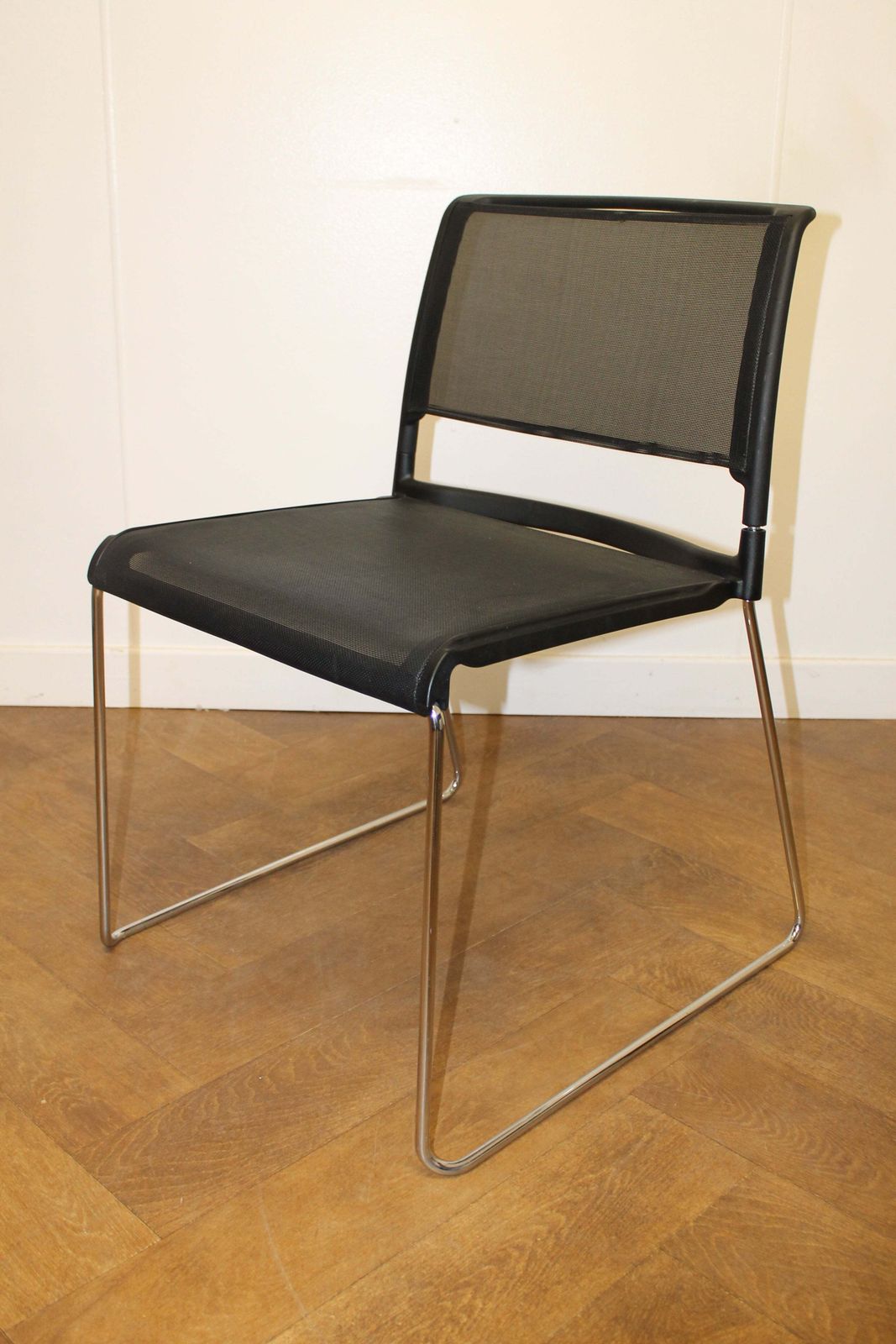 Used Black Mesh Wilkhahn Stacking Chairs Sold As A Set Of 4 photo furniture