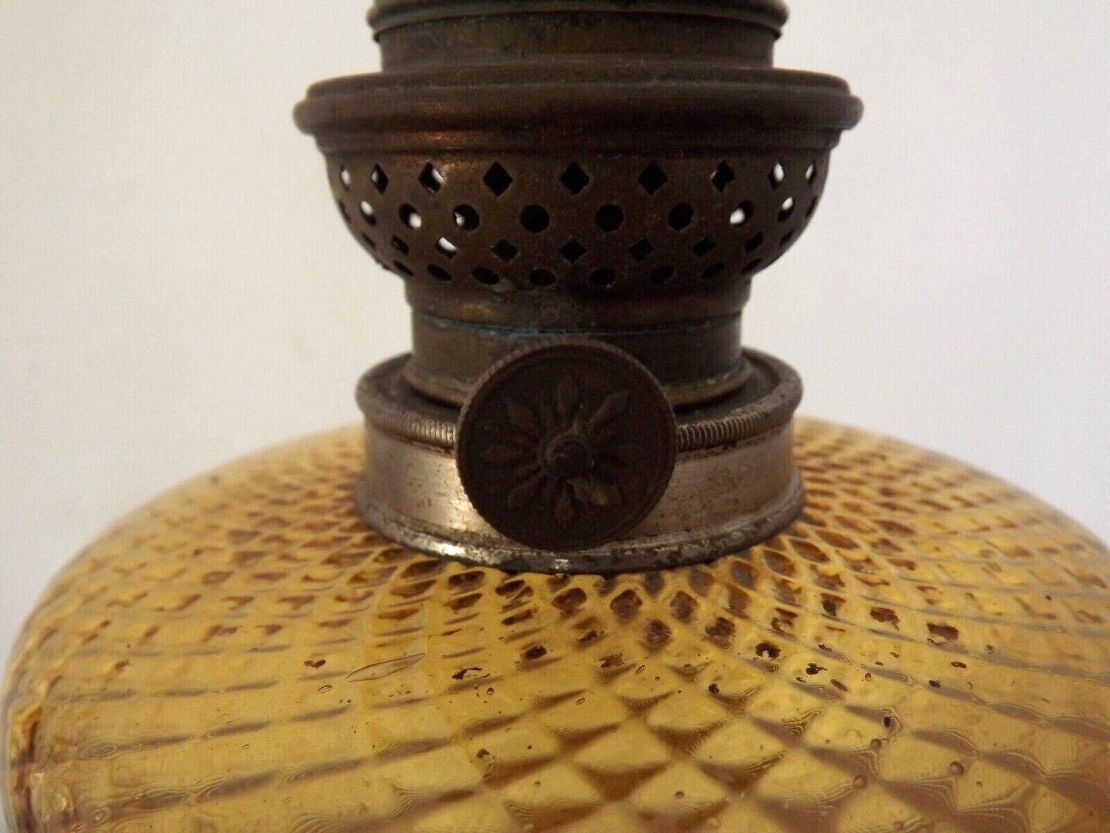French Vintage Oil Lamp – Decorative Silver Metal Base, Amber Glass Oil Well & Hand Blown Glass Funnel   French Vintage Lighting. Oil Lamp. photo vintage