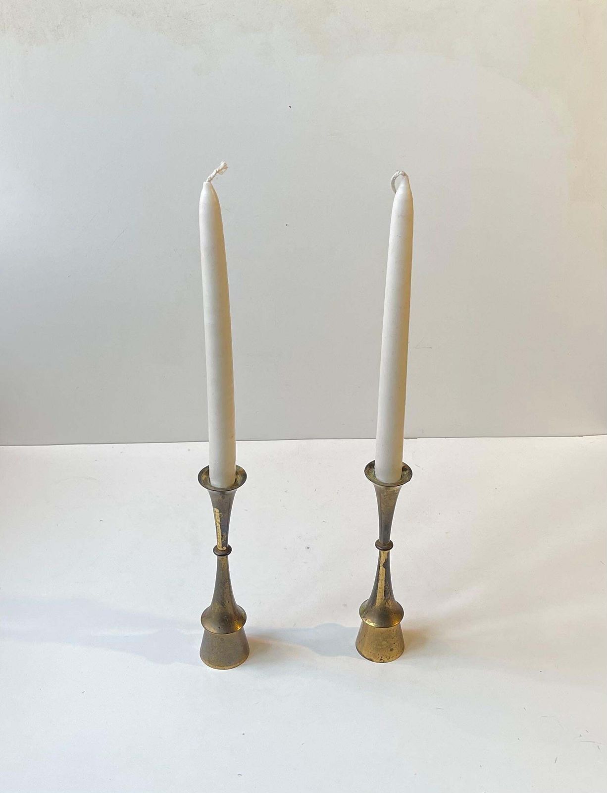 A Pair Of Jens Harald Quistgaard Candlesticks In Patinated Brass, 1960s photo furniture