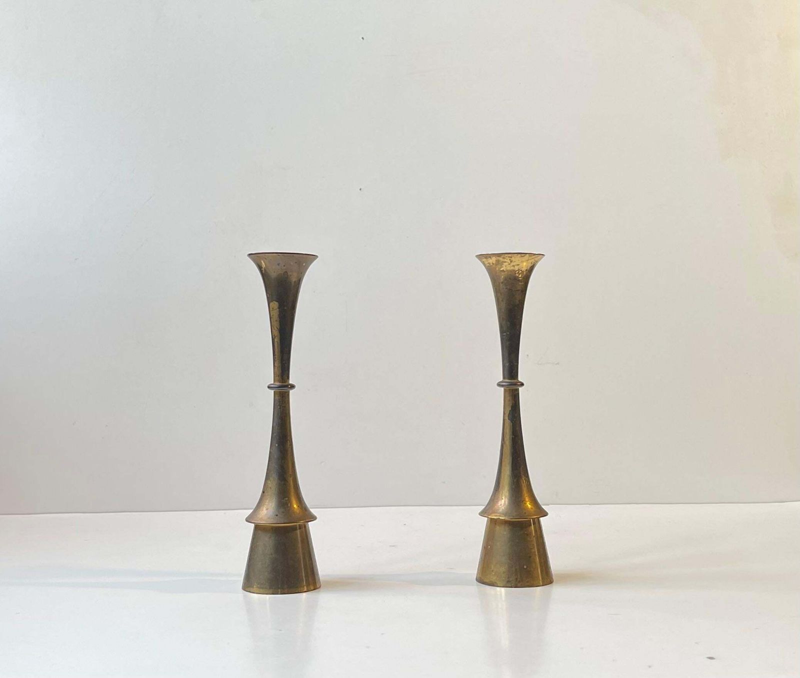 A Pair Of Jens Harald Quistgaard Candlesticks In Patinated Brass, 1960s photo for sale